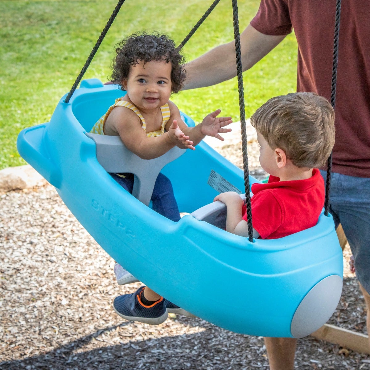 Rocket Swing for Two with adult pushing.