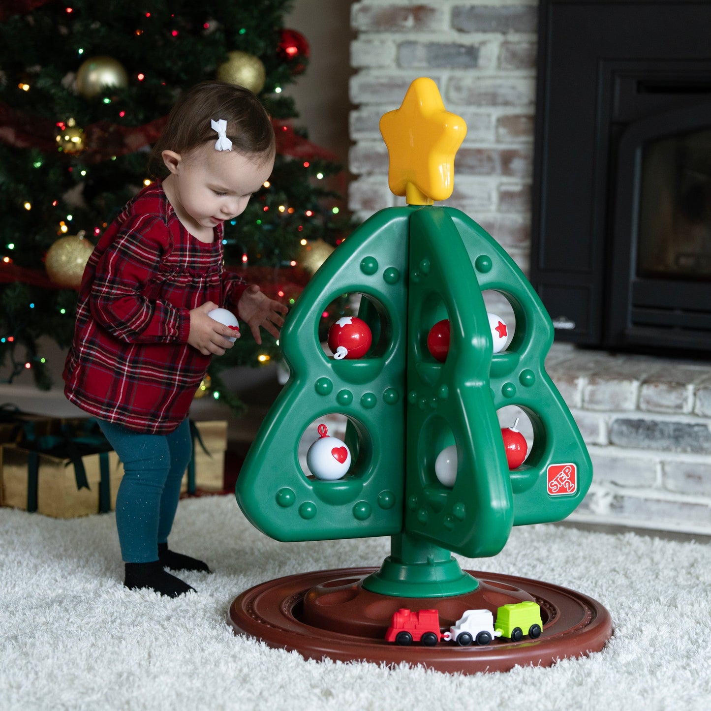 My First Christmas Tree™ with Red & White Ornaments  child decorating