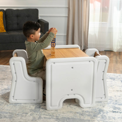 Harmony Table and Chairs™ with boy playing at table