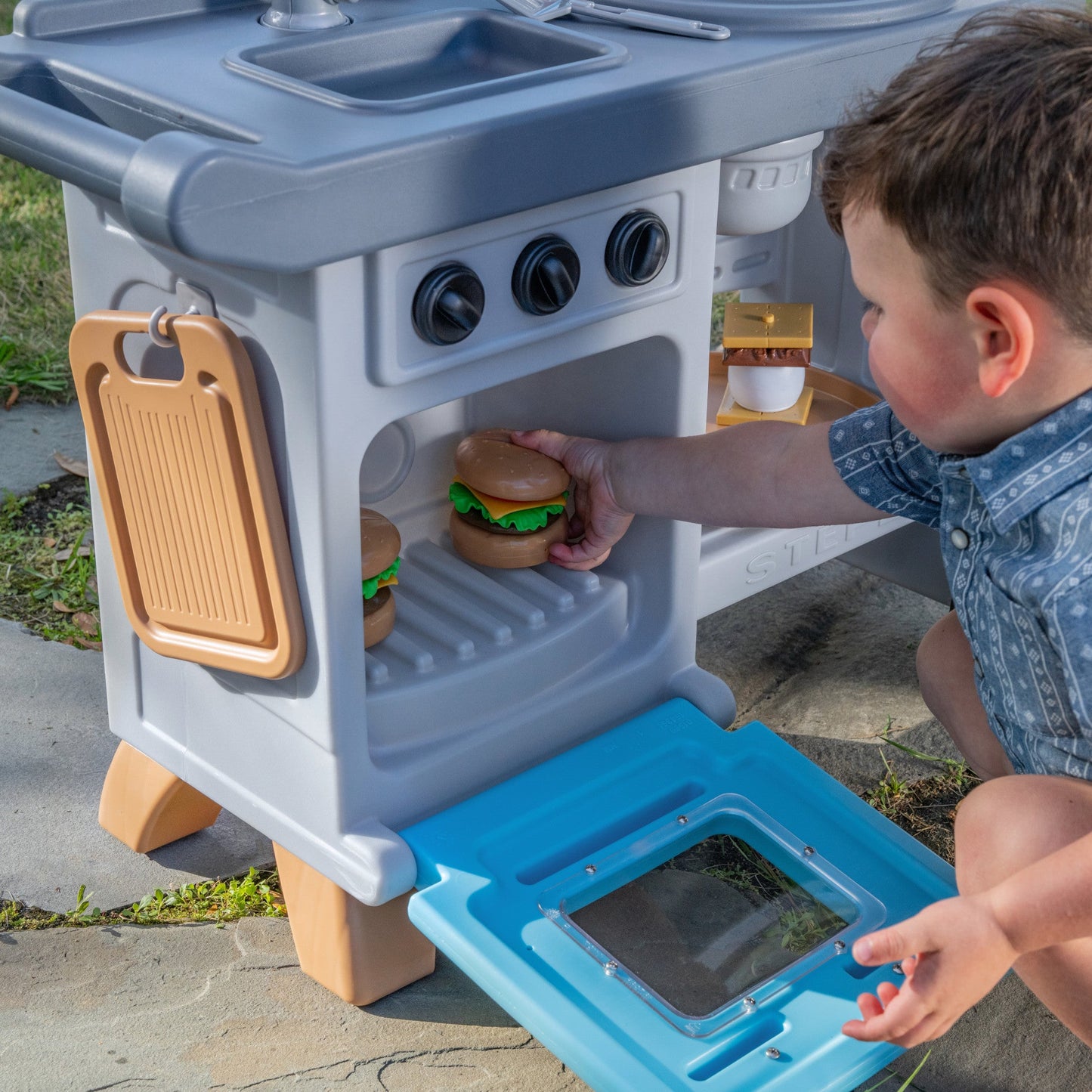 Grill & Go BBQ Cart with Lights and Sounds™ opening oven door