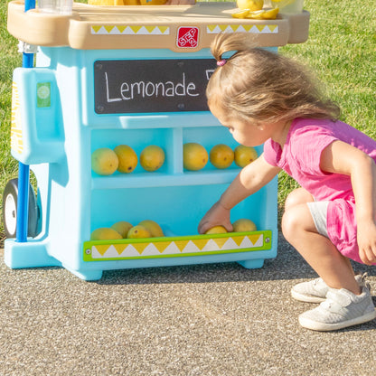 My First Lemonade Stand™ storage underneath chalkboard