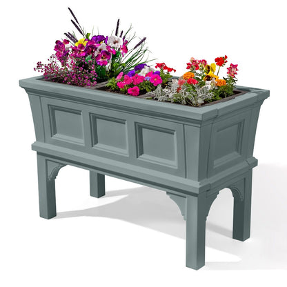 Atherton Raised Planter Sage Gray with flowers.