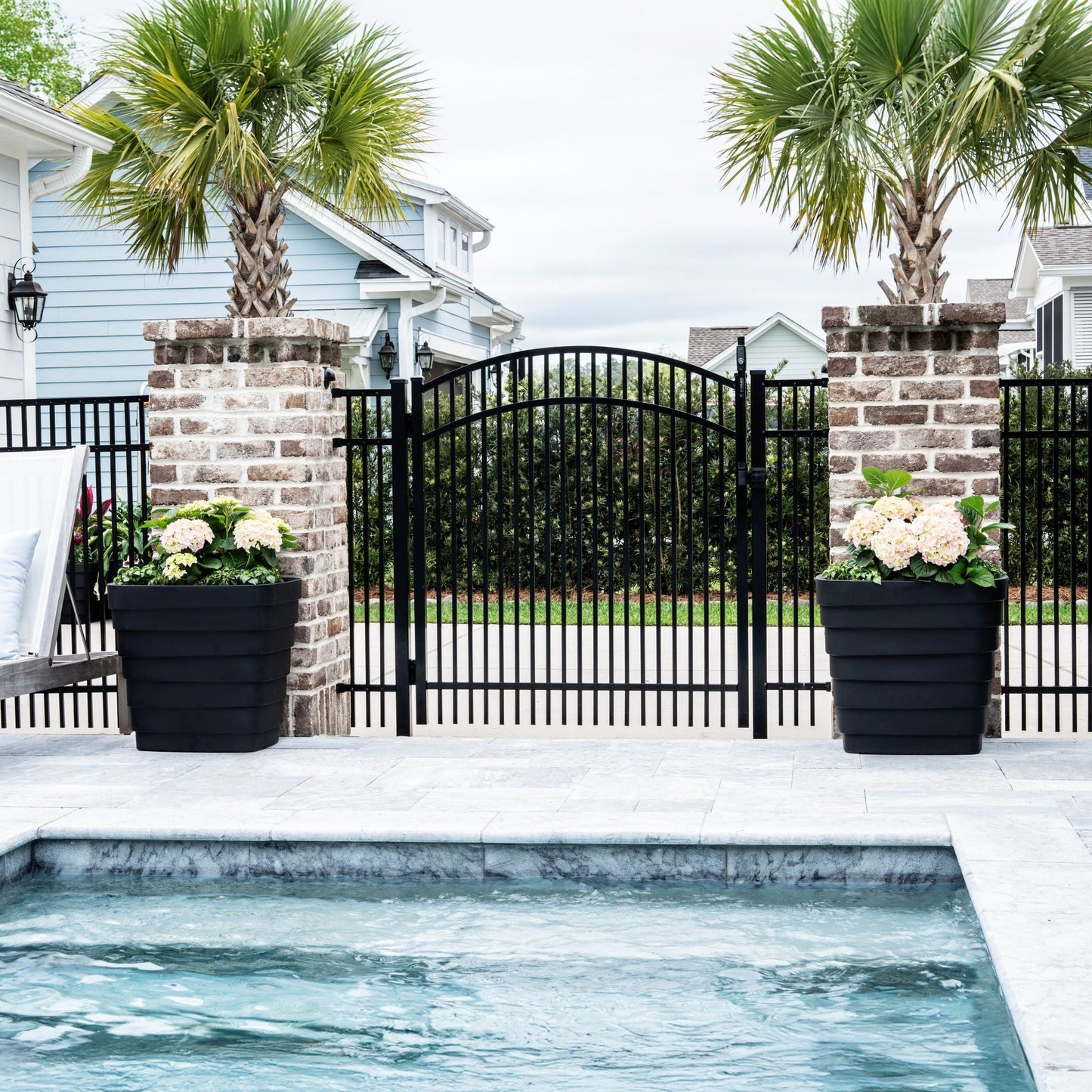 Wave Planter™ 20X24 2 Pack - Black shown poolside