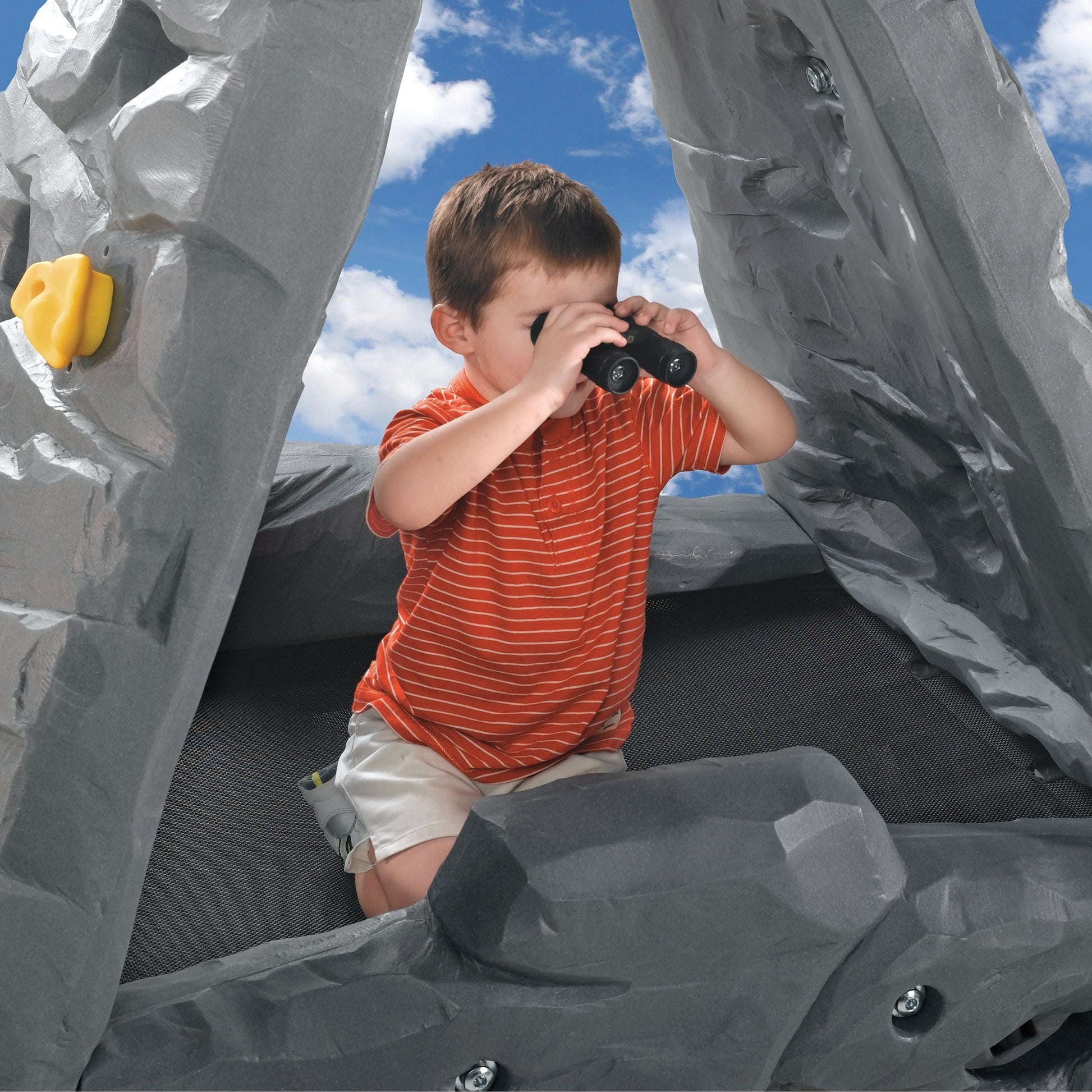 Skyward Summit boy kneeling on net floor<br />