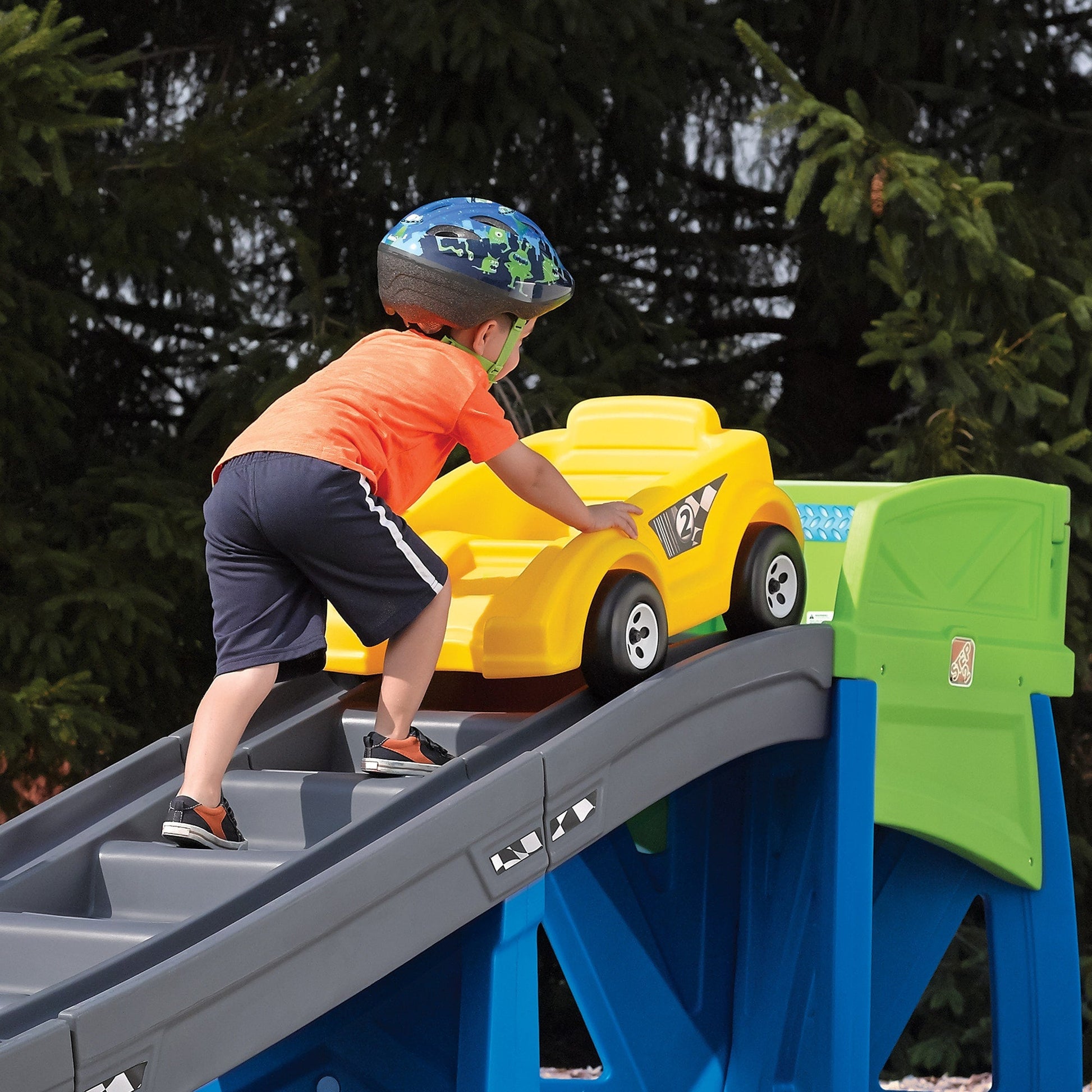 Extreme Coaster - kids push the coaster car up the stairs