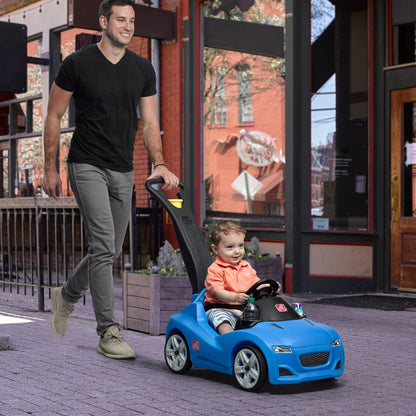 Whisper Ride Cruiser - Blue with man pushing