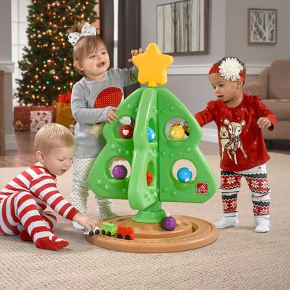 Kids playing with Christmas Tree toy